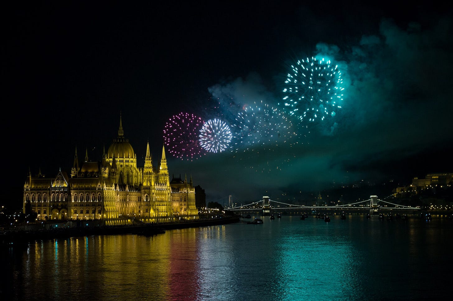 Fireworks over the Hungarian Parliament and Danube during St Stephen’s Day celebrations in Budapest. Fireworks over the Hungarian Parliament and Danube during St Stephen’s Day celebrations in Budapest.