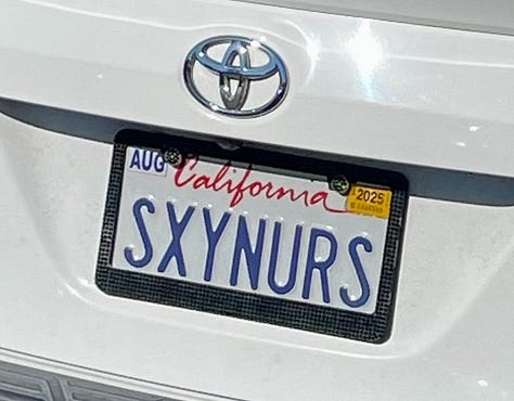 License plates reading DOGGRL, EX TESLA, SXYNURS, 2HENTAI, FEMD❤️M, and DZOOGOO