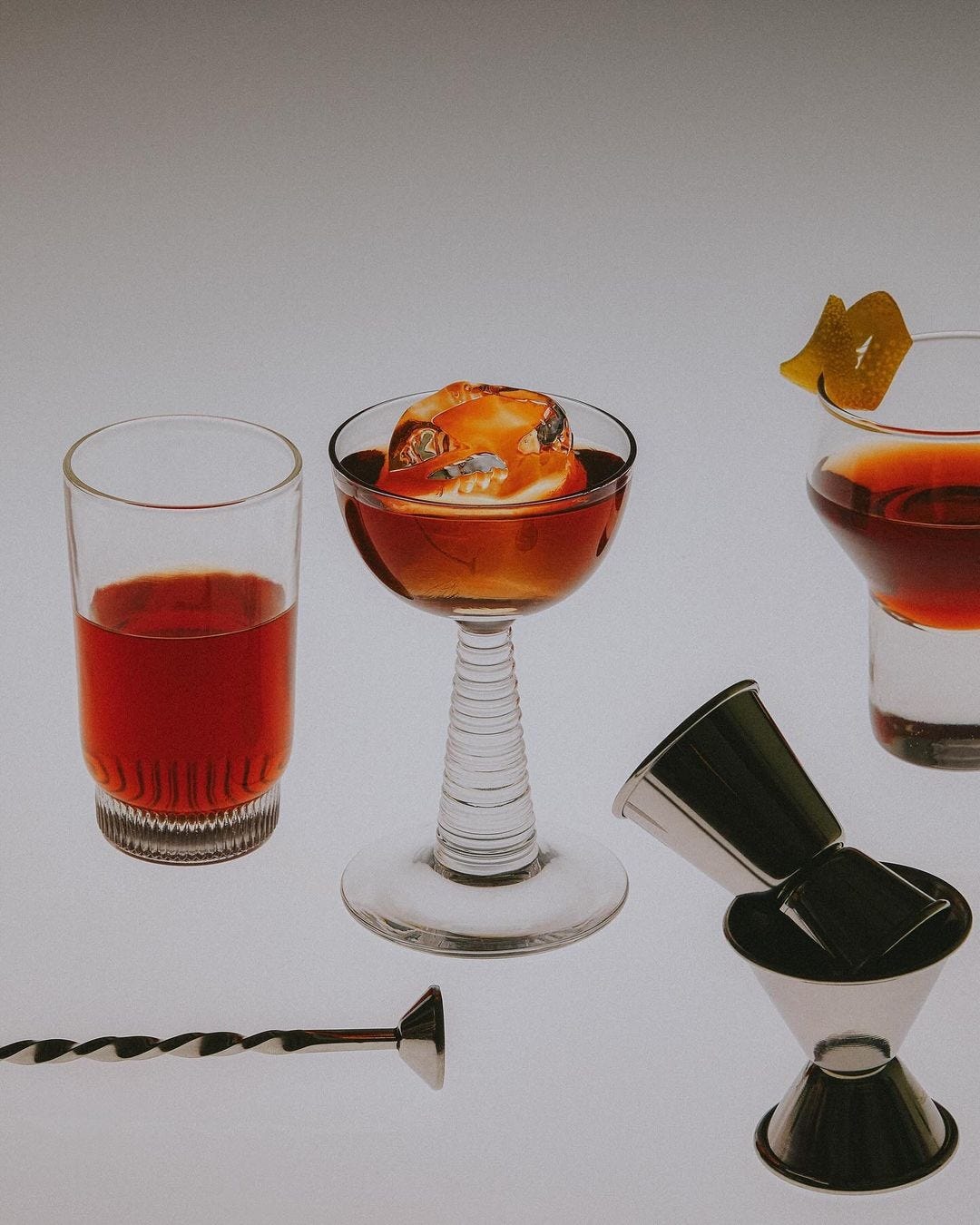 An Instagram  post added on Jan 26, 2024. The author is @brefurlong. May present: drink, negroni, cocktail garnish, wine glass, food.