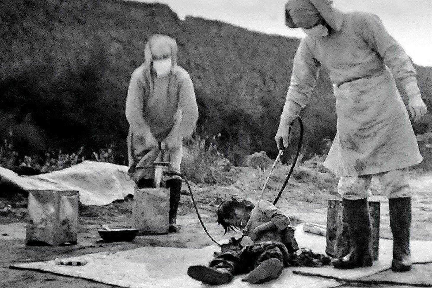 Japanese researchers from Unit 731 conducting a grim 'Plague Prevention' action in China, November 1940. This secret unit engaged in horrific human experimentation, responsible for an estimated 200,000-300,000 deaths.