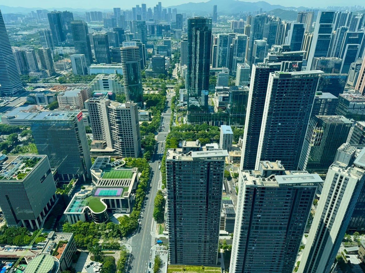 Shenzhen Bay from the 58th floor, Shenzhen. July 2026. Shenzhen Bay from the 58th floor, Shenzhen. July 2026.