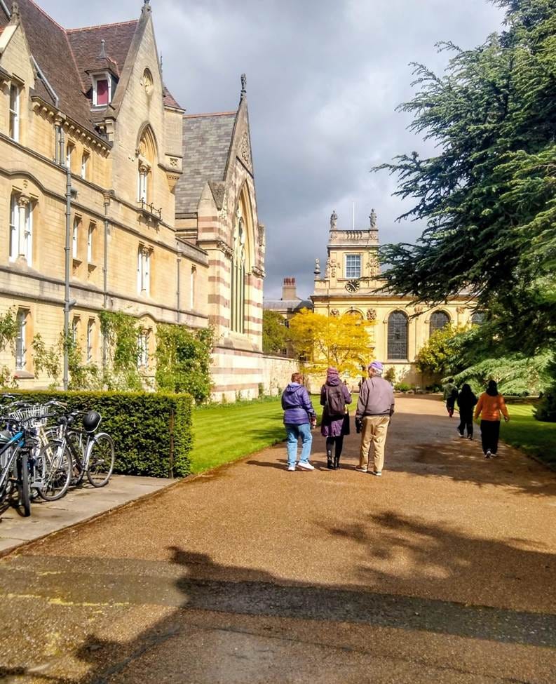 A group of people standing on a path in front of a building
AI-generated content may be incorrect. A group of people standing on a path in front of a building
AI-generated content may be incorrect.