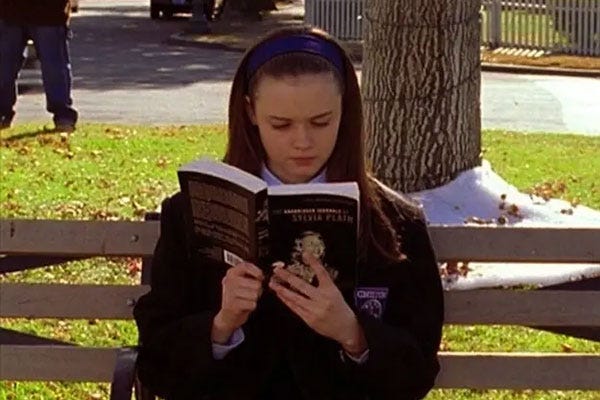 Rory Gilmore reading on bench  | rmrk*st | Remarkist Magazine