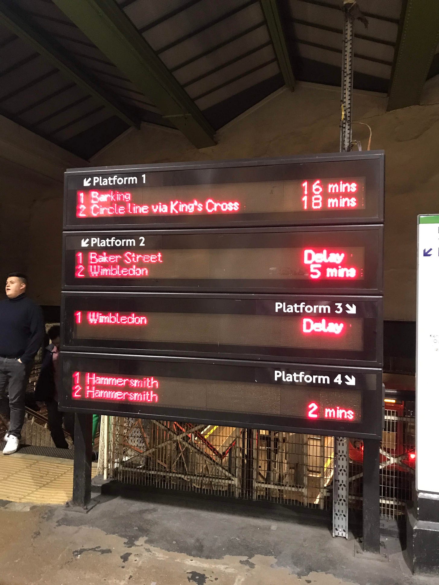 Photo showing next train screens in station entrance at Edgware Road. Photo showing next train screens in station entrance at Edgware Road.