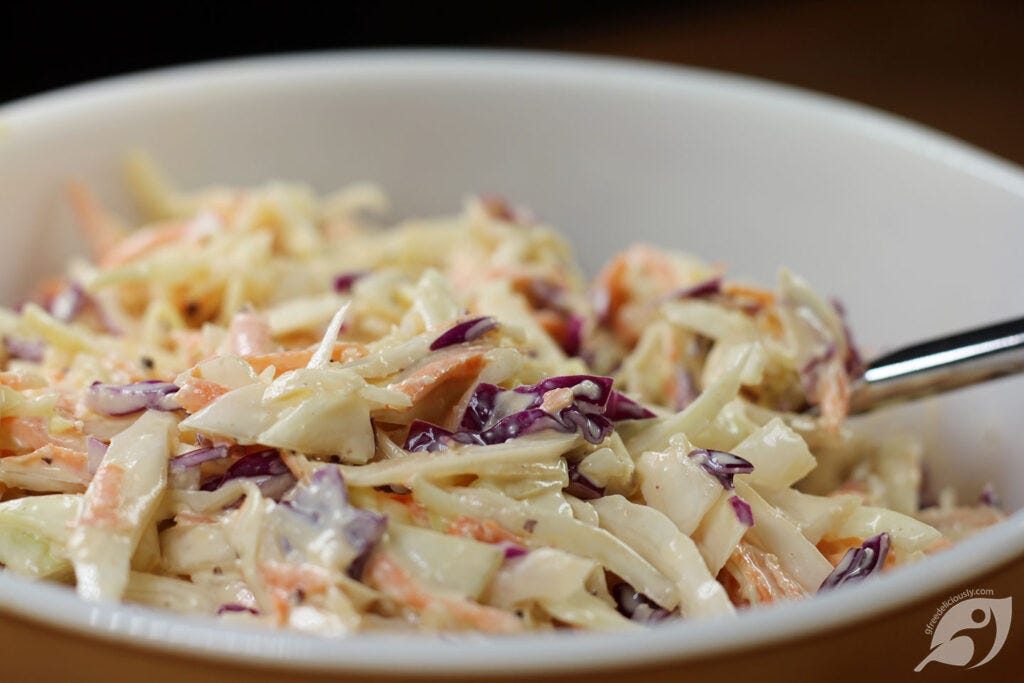 Creamy Coleslaw closeup in serving bowl Creamy Coleslaw closeup in serving bowl