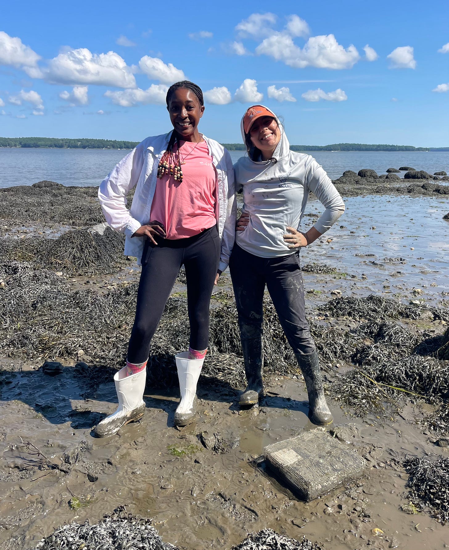 Jaidyn and Jannine pose for the camera during muddy fieldwork. Jaidyn and Jannine pose for the camera during muddy fieldwork.