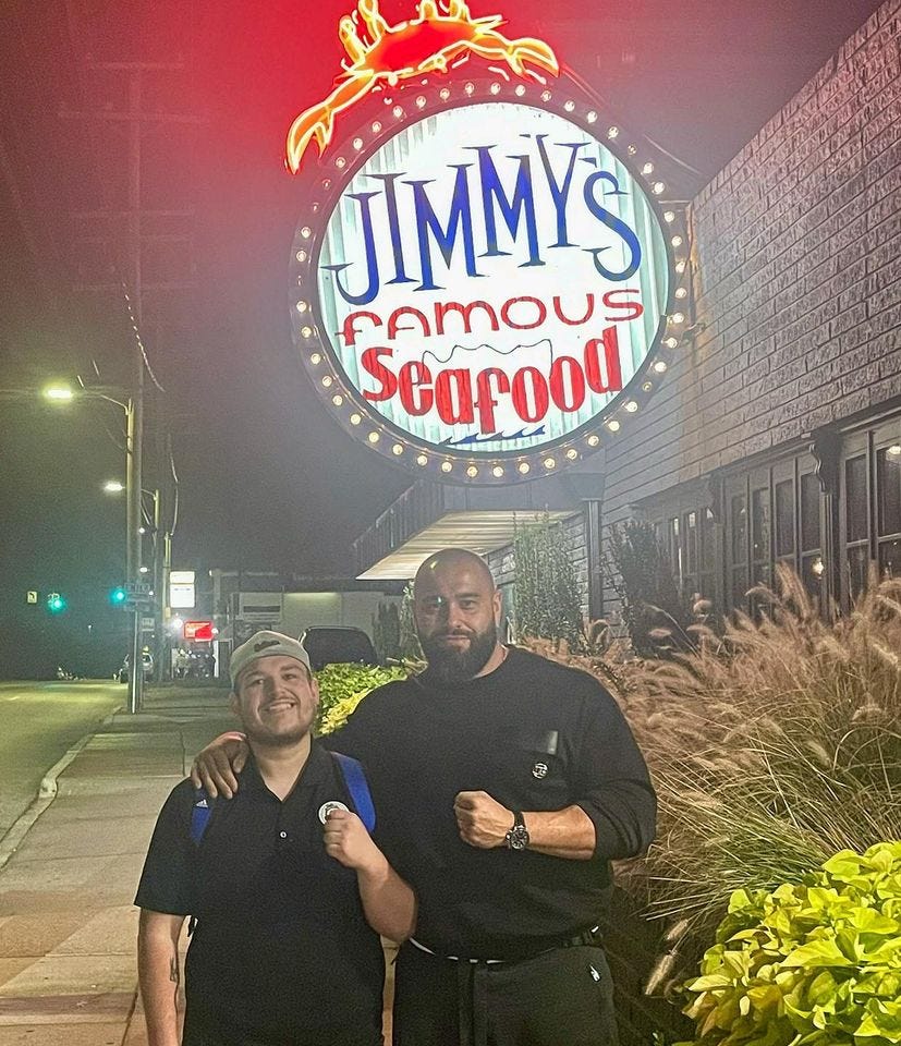 May be an image of 2 people, beard, people standing and outdoors