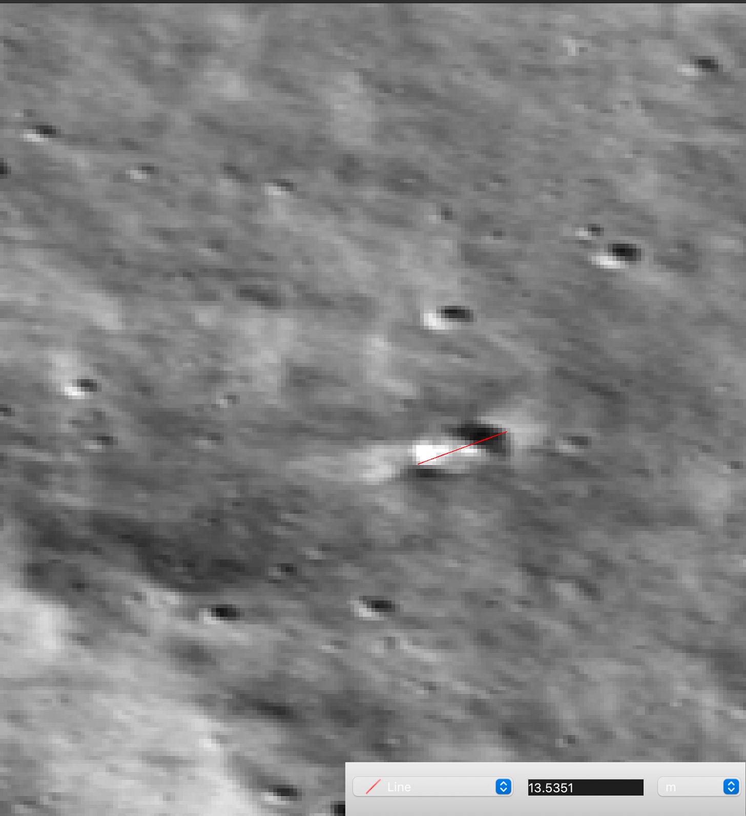The crater resulting from the Luna 25 crash spans approximately 13.5 meters in diameter, marking a stark testament to the force of the impact. The crater resulting from the Luna 25 crash spans approximately 13.5 meters in diameter, marking a stark testament to the force of the impact.