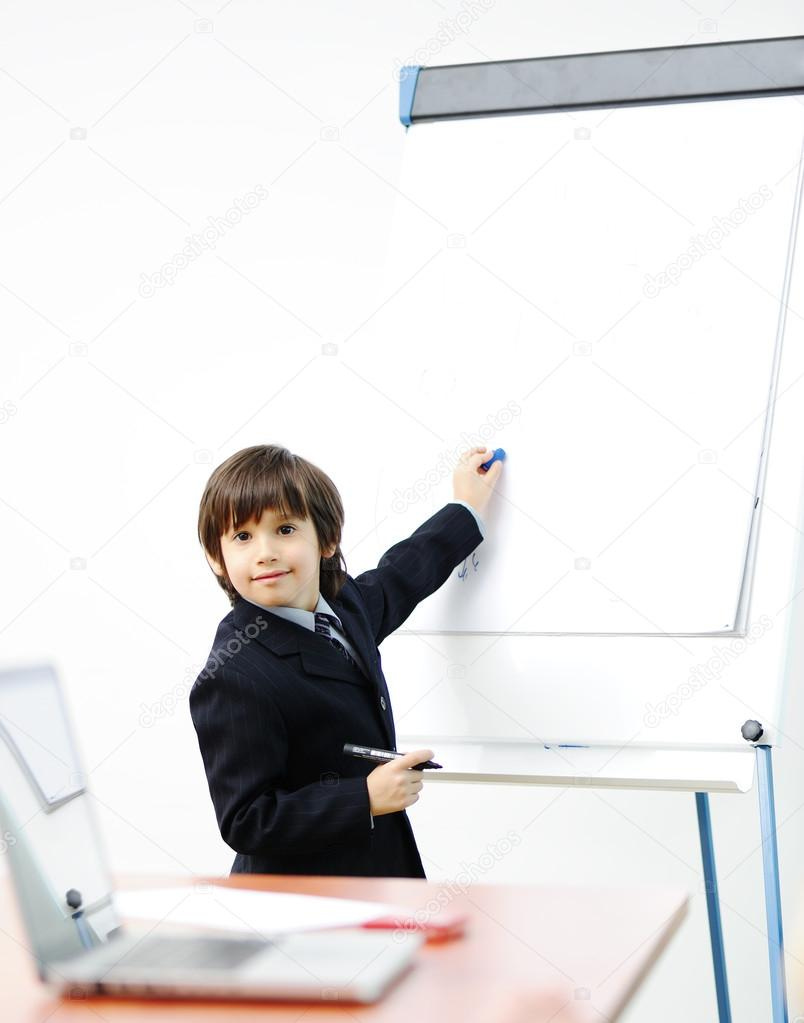 Genius kid on business presentation speaking to adults and giving them a  lecture — Stock Photo © zurijeta #21439287