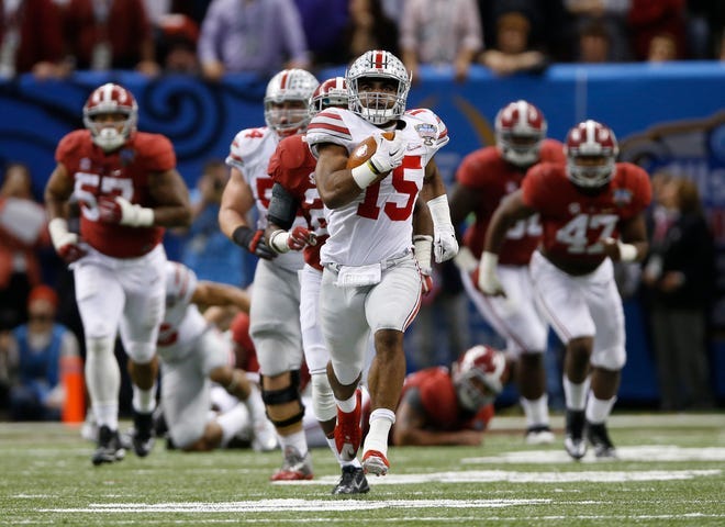 Ohio State running back Ezekiel Elliott sets sail on an 85-yard touchdown run that almost, but not quite, clinched the Buckeyes' 2015 Sugar Bowl victory over Alabama.