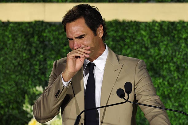 Inductee Roger Federer shows emotion while delivering a speech during the International Tennis Hall of Fame 2026 Induction Ceremony on August 29,...