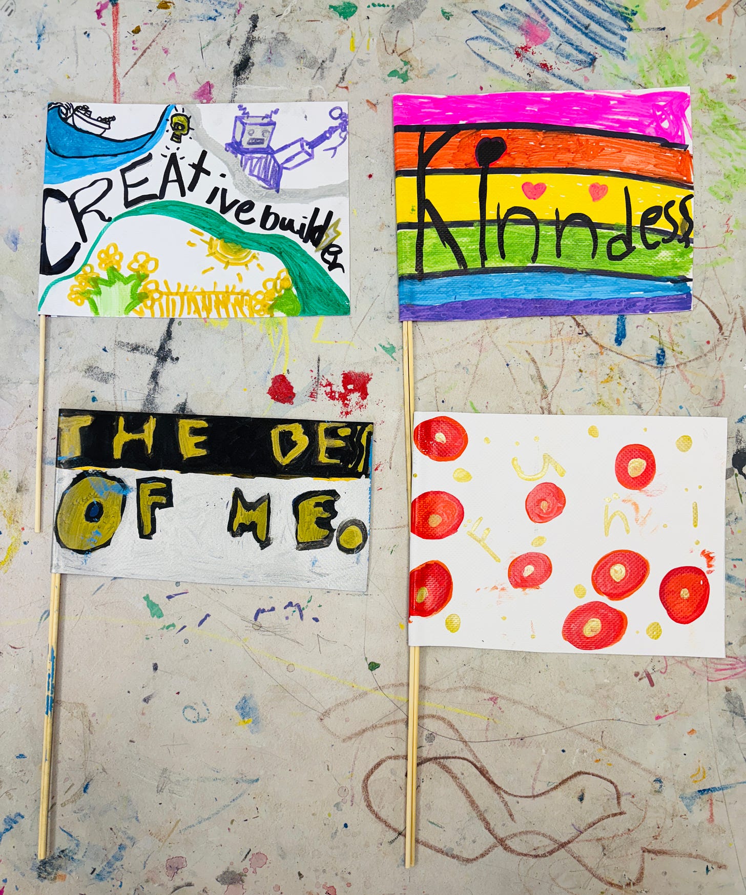 4 mini-flag examples laying flat on a table.