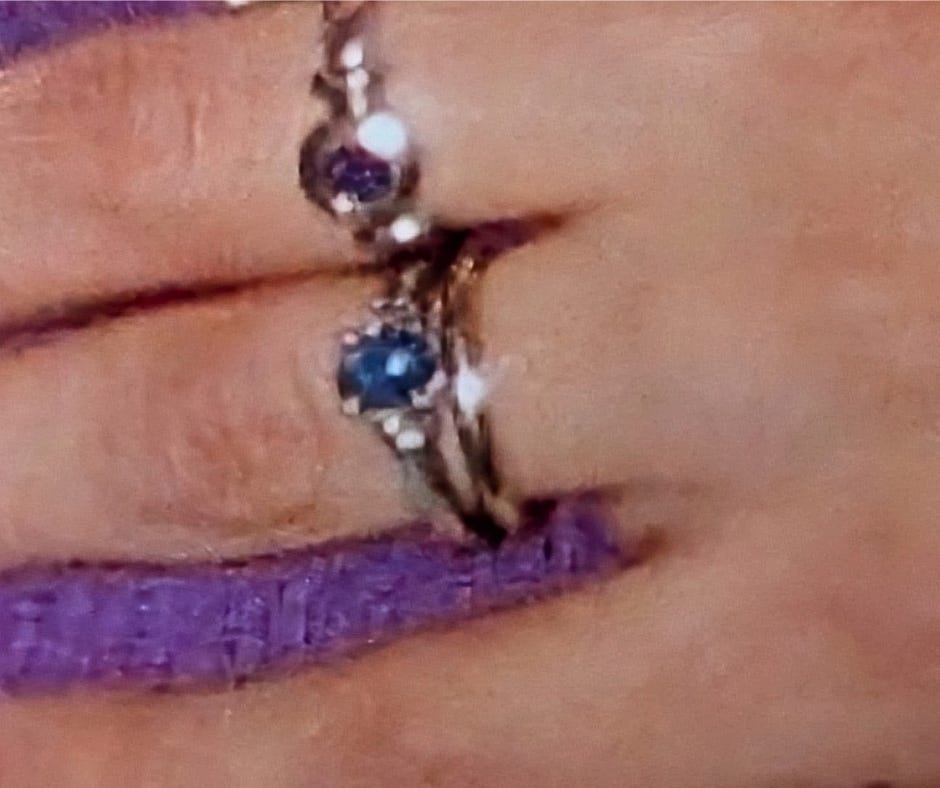 sapphire purple amethyst wedding ring on woman's hand sapphire purple amethyst wedding ring on woman's hand