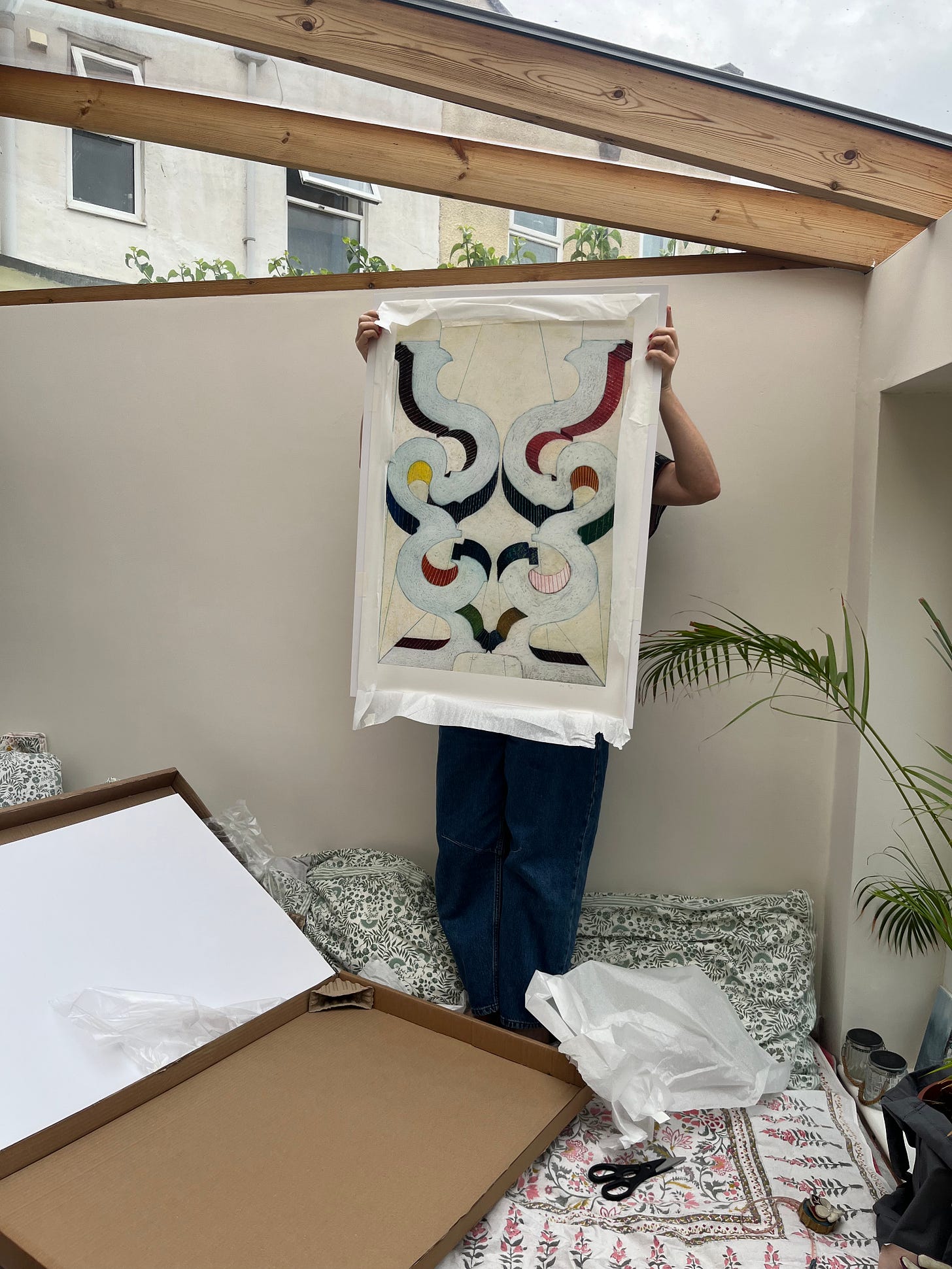 me holding print up