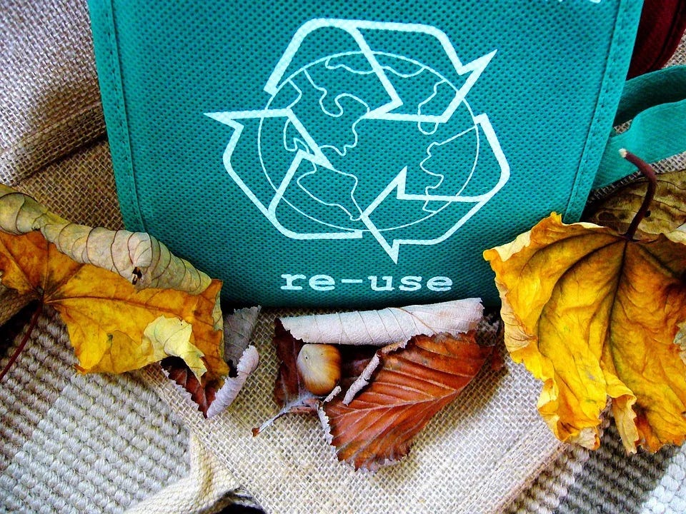 Recycle waste material to create new material.