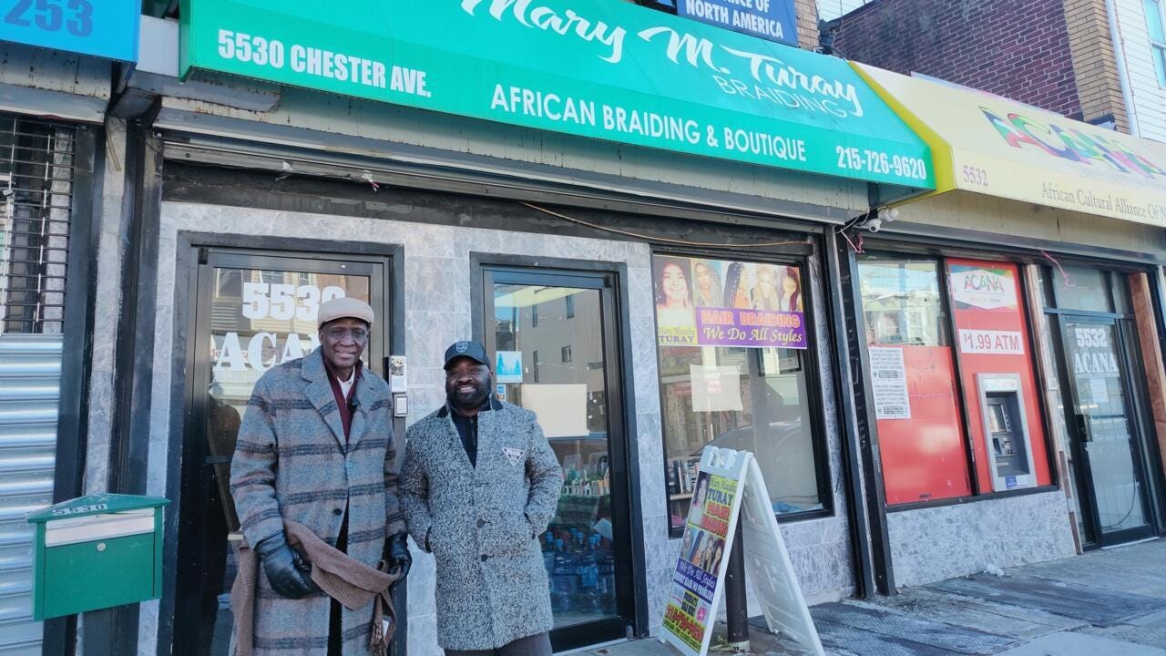 Founder Voffee Jabatee and project manager Musa Trawally of the African Cultural Alliance of North America (ACANA) stand in front of their Africatown offices in Philadelphia. Founder Voffee Jabatee and project manager Musa Trawally of the African Cultural Alliance of North America (ACANA) stand in front of their Africatown offices in Philadelphia.