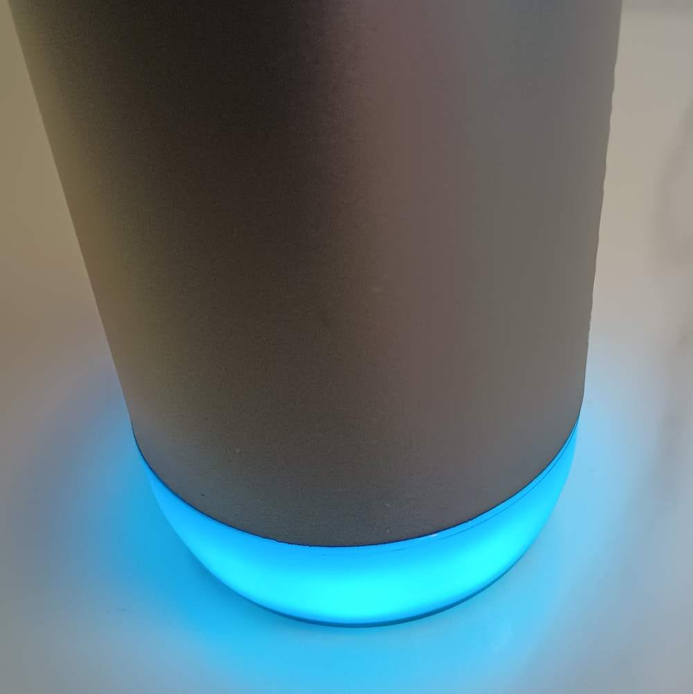 bottom of water bottle glowing blue.