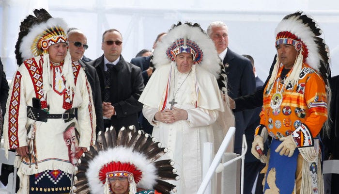 https://www.osvnews.com/wp-content/uploads/2022/08/Pope-wears-headdress-20220725T1430-POPE-MASKWACIS-17308081-700x400.jpg