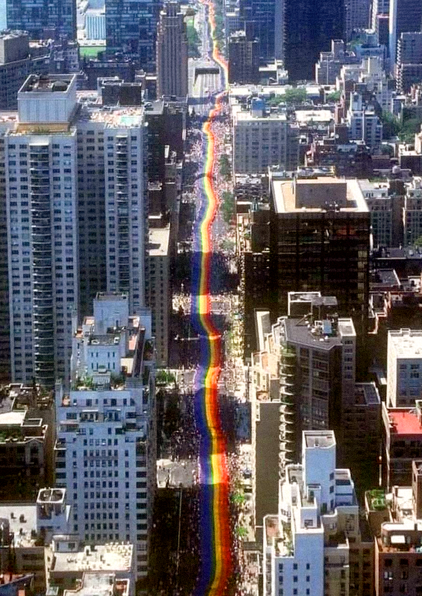A powerful display of pride: gay activists carry a mile-long rainbow banner through New York City to mark the 25th anniversary of the Stonewall riots, June 26, 1994.