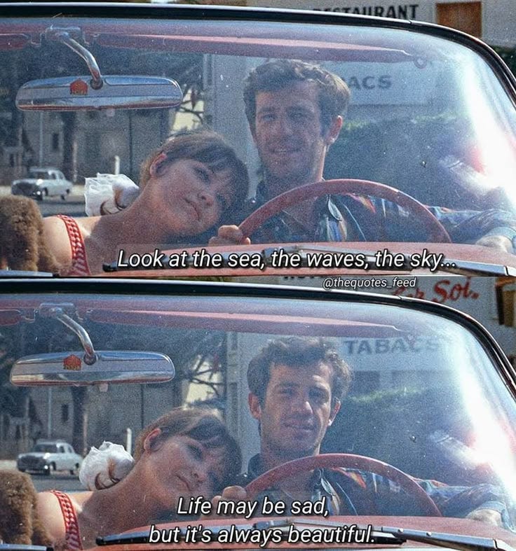 This may contain: two people sitting in the driver's seat of a car