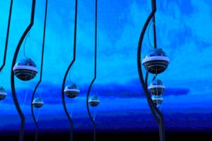 An artist's rendering of some of the detectors buried in ice that make up the IceCube Neutrino Observatory.