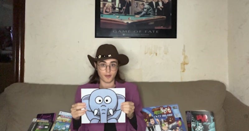 Me holding a photo of an elephant in my "What Happened To Gaming Forums?" video Me holding a photo of an elephant in my "What Happened To Gaming Forums?" video