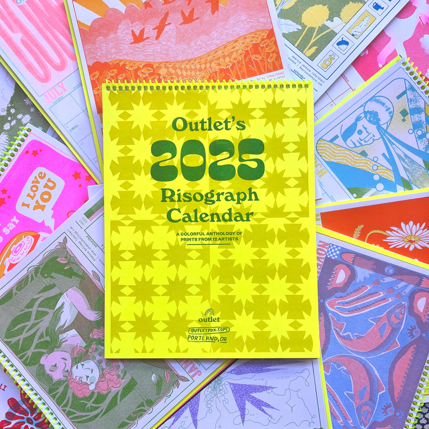 pile of 2025 risograph calendars that my art was featured in