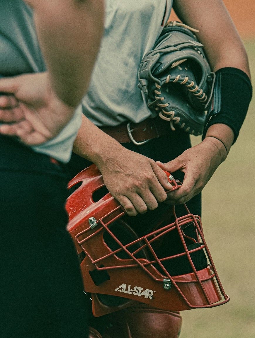 a close up of a catchers mitt and a catchers mitt