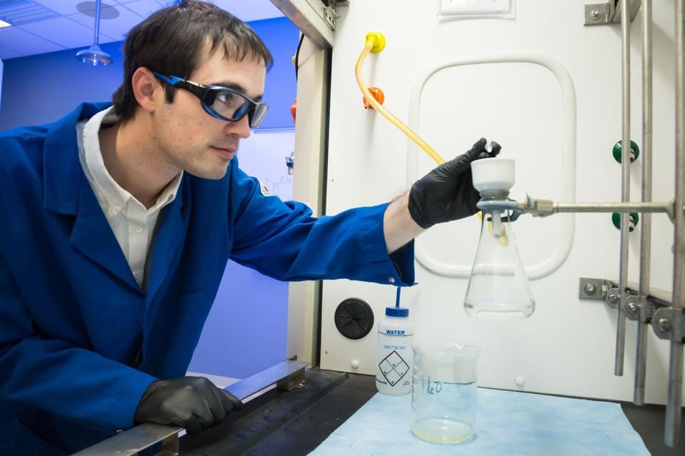 Scientist working on carbon capture chemistry Scientist working on carbon capture chemistry