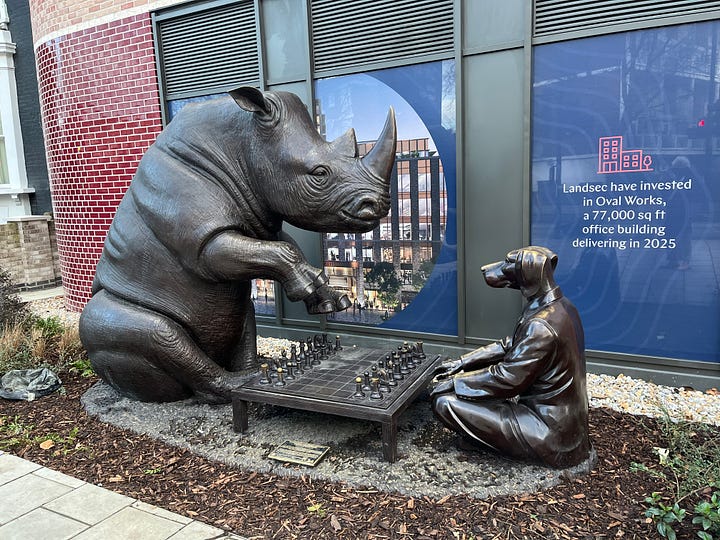 first photo sculpture of rhino & dog playing chess by Gillie and Marc. second photo of brightly colourful Beefeater mural