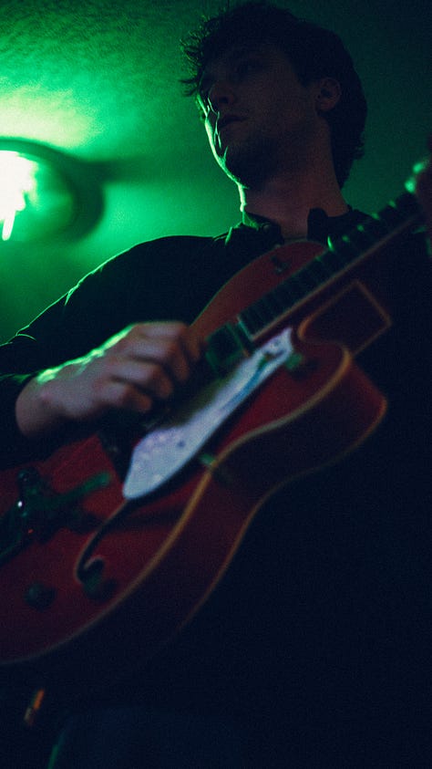 a bunch of rad photos with a rad rock band Kasador, and their fans in an underground house party in Calgary
