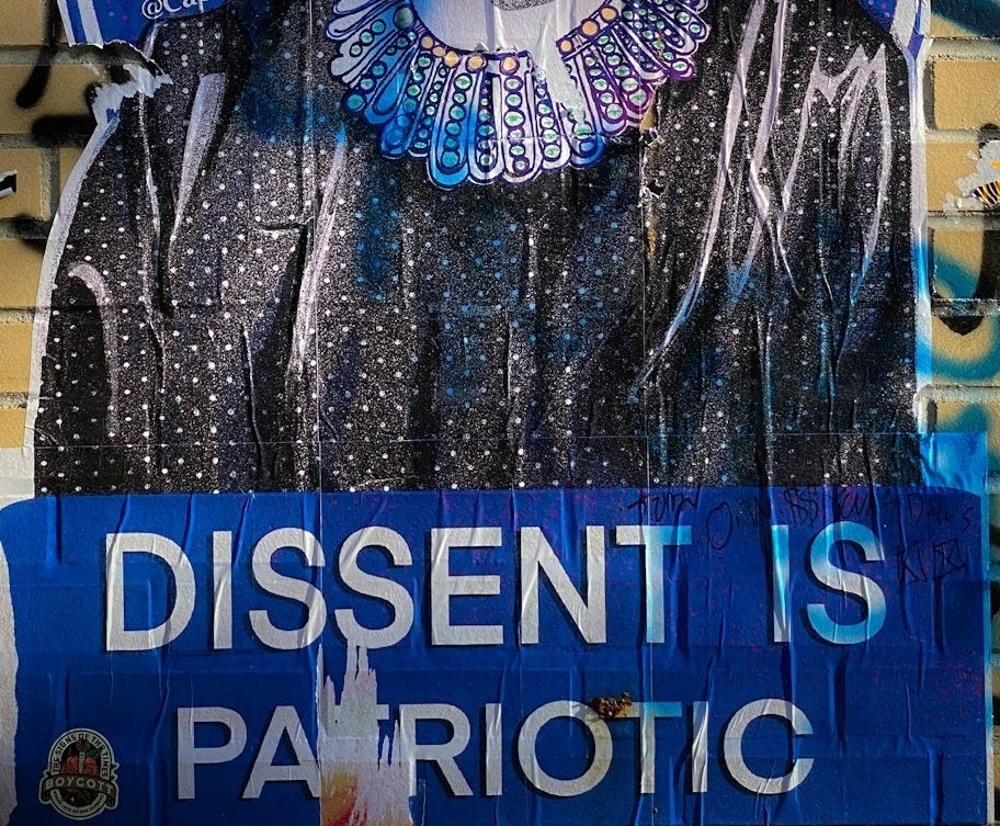 man in black leather jacket graffiti