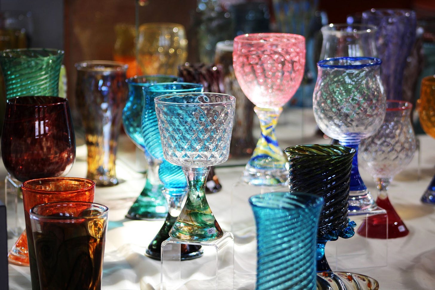 Image of blown glass goblets via Tash Guimond of Unsplash