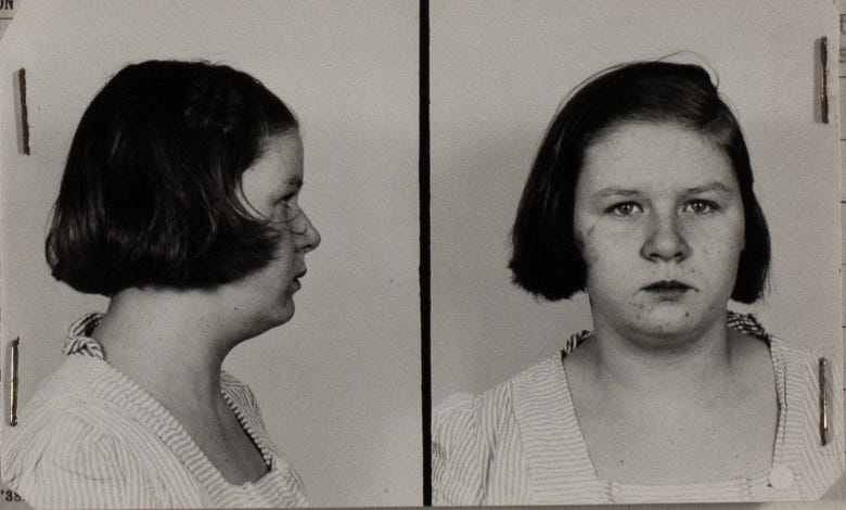 Two mug shots in black and white from 1945 of a 17 year old girl, white, with acne and medium length brown hair in a striped dress Two mug shots in black and white from 1945 of a 17 year old girl, white, with acne and medium length brown hair in a striped dress