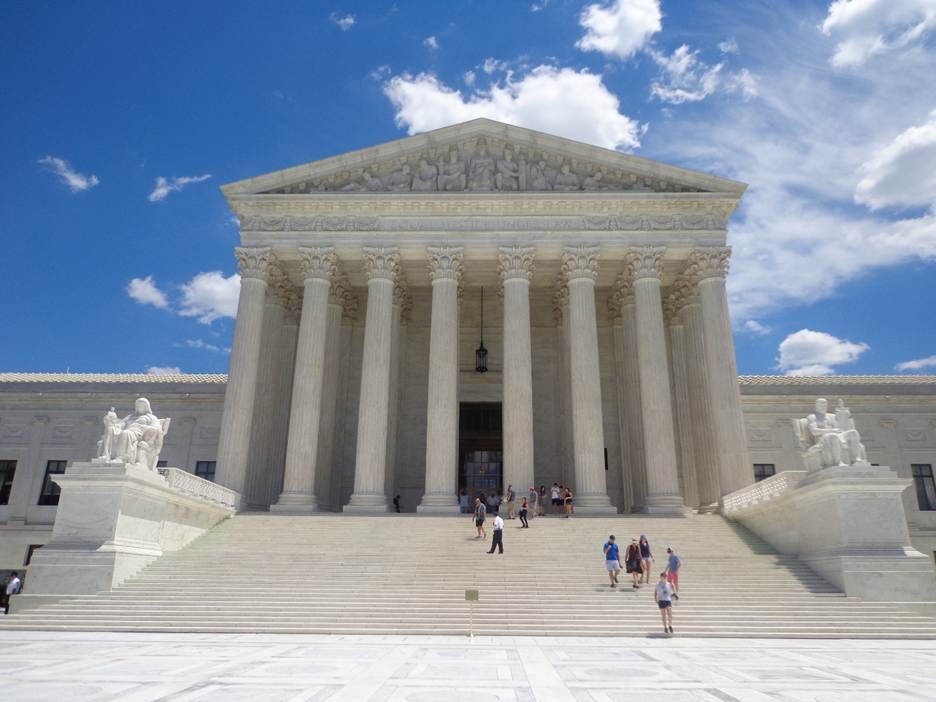 United States Supreme Court Building with columns and a staircase

AI-generated content may be incorrect.