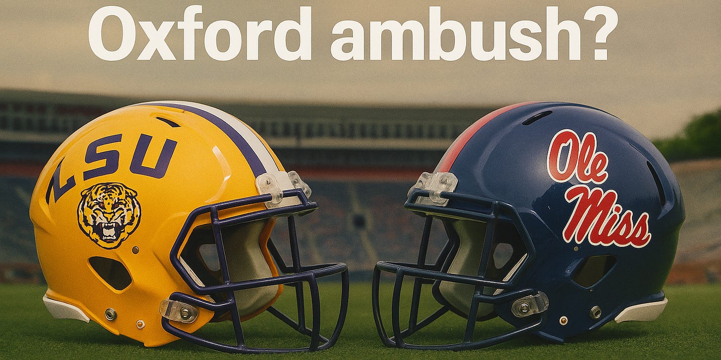 LSU Tigers and Ole Miss Rebels football helmets facing off on the field at Vaught-Hemingway Stadium, with bold headline “Oxford ambush?” above. Magnolia Bowl Rivalry game coverage, SEC football analysis, deals on fan gear, seats, and premium content at www.NattyRoad.com
