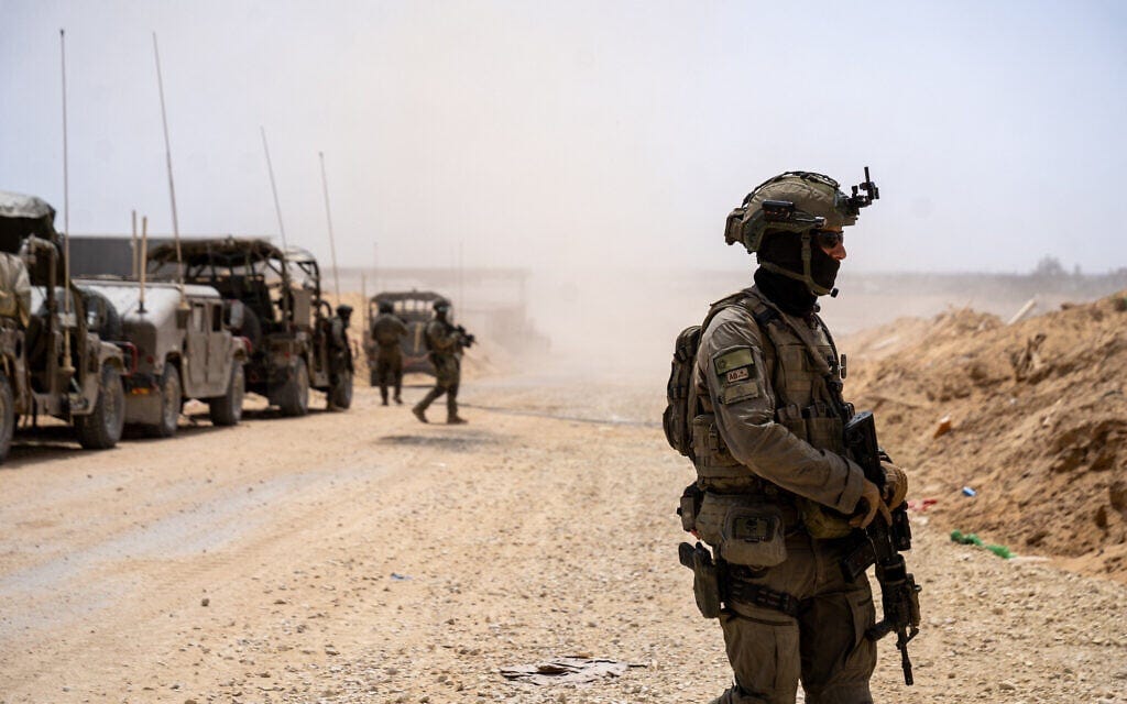 IDF troops are seen in the Morag Corridor area in the southern Gaza Strip, April 21, 2025. (Emanuel Fabian/Times of Israel)