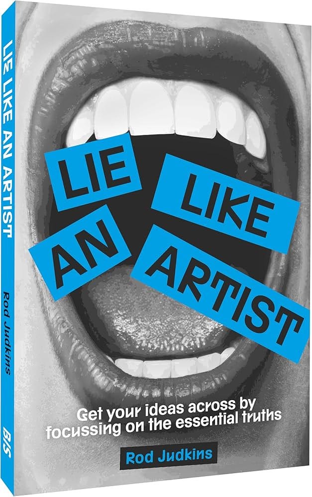 3D angled view of Lie Like an Artist by Rod Judkins, featuring a bold black-and-white cover with blue typography over an open mouth. The book explores communication techniques inspired by artistic storytelling and exaggeration.