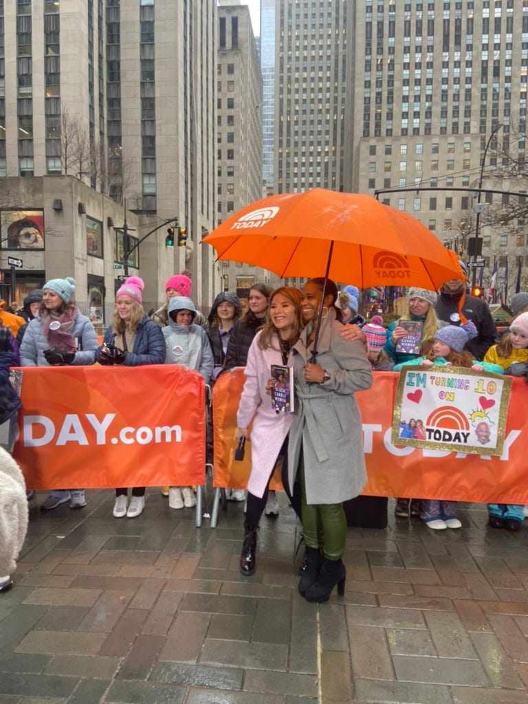 Diane on the Today Show plaza taking a photo with Jenna Bush Hager with audience behind