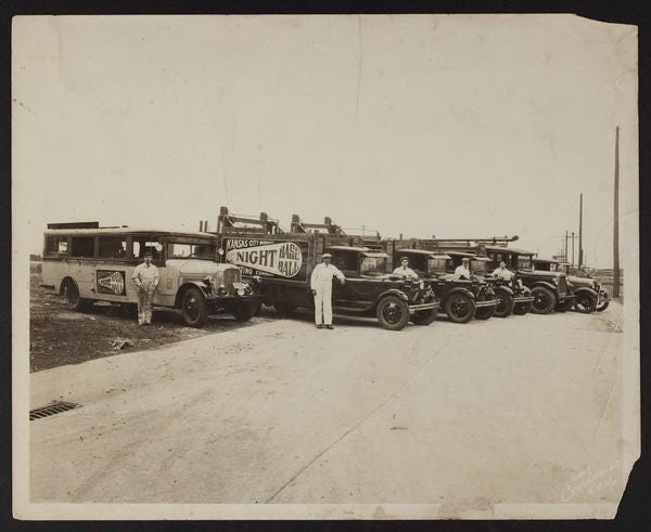 A group of cars parked on the side of a road
Description automatically generated A group of cars parked on the side of a road
Description automatically generated
