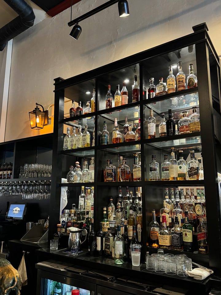 Rabalais' counter and bar, pre- and post-upgrade, plus live band.