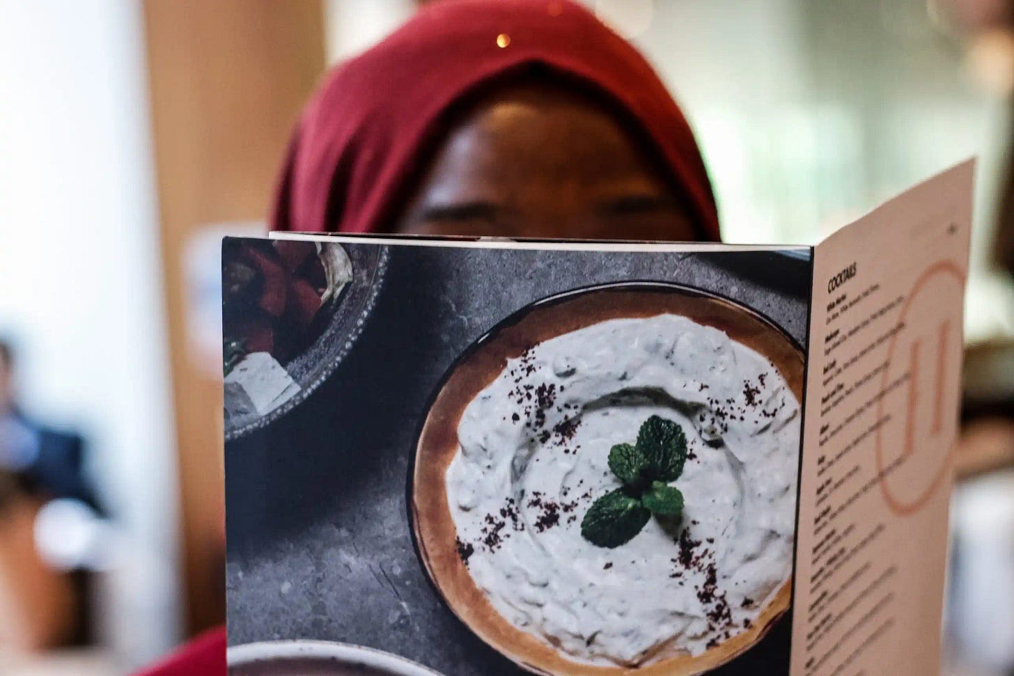 Woman reading food menu