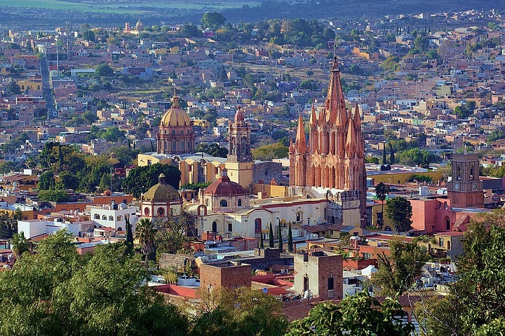 images of the large church of San Miguel de Allende and the surrounding streets