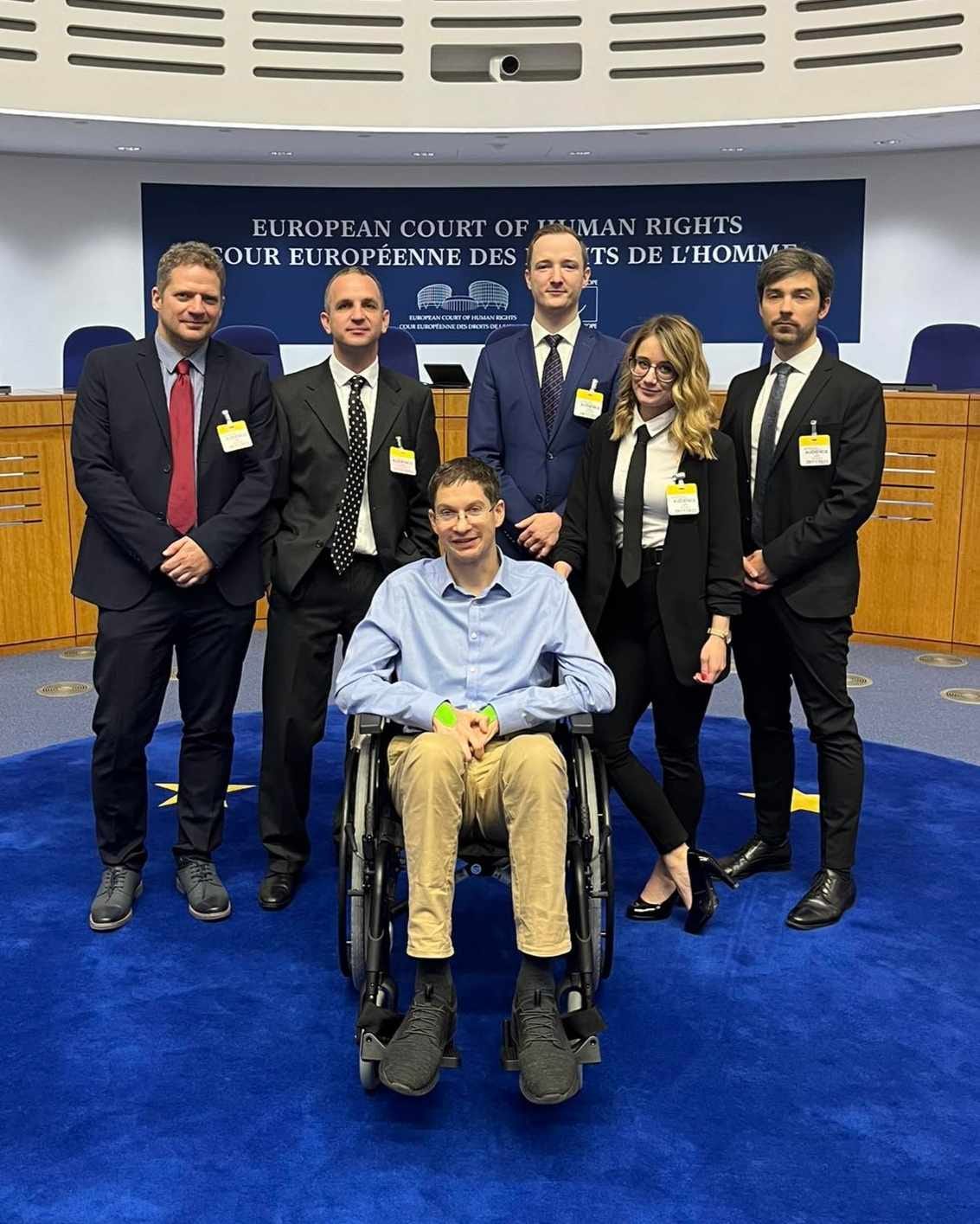 May be an image of 6 people and text that says 'SERD EUROPEAN COURT OF KUMAN RIGHTS OUR EUROPÉENNE EURO DES TS DE L'HOMM' May be an image of 6 people and text that says 'SERD EUROPEAN COURT OF KUMAN RIGHTS OUR EUROPÉENNE EURO DES TS DE L'HOMM'