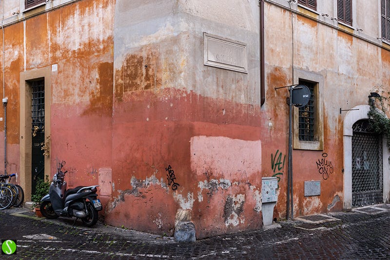 Steve Butcher photo of distressed red wall in central Rome 2025
