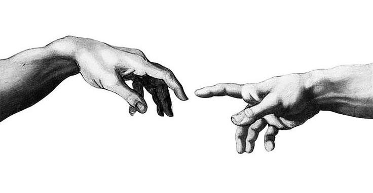 This may contain: two hands reaching out towards each other with one hand holding the other's finger