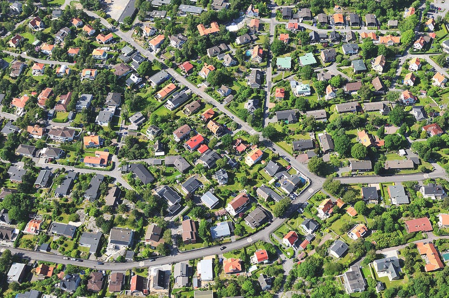 Aerial View Of Suburb by Johner Images Aerial View Of Suburb by Johner Images