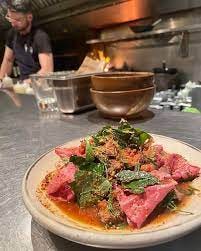A plate of food on a counter

Description automatically generated