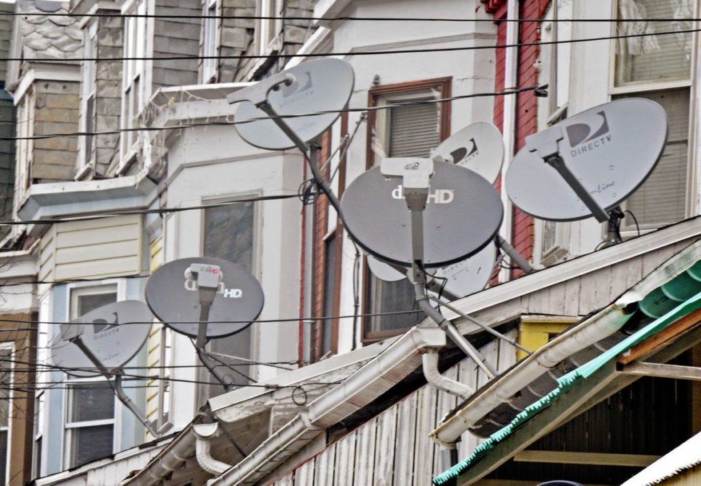 Do developers really want a sea of satellite dishes on roofs?