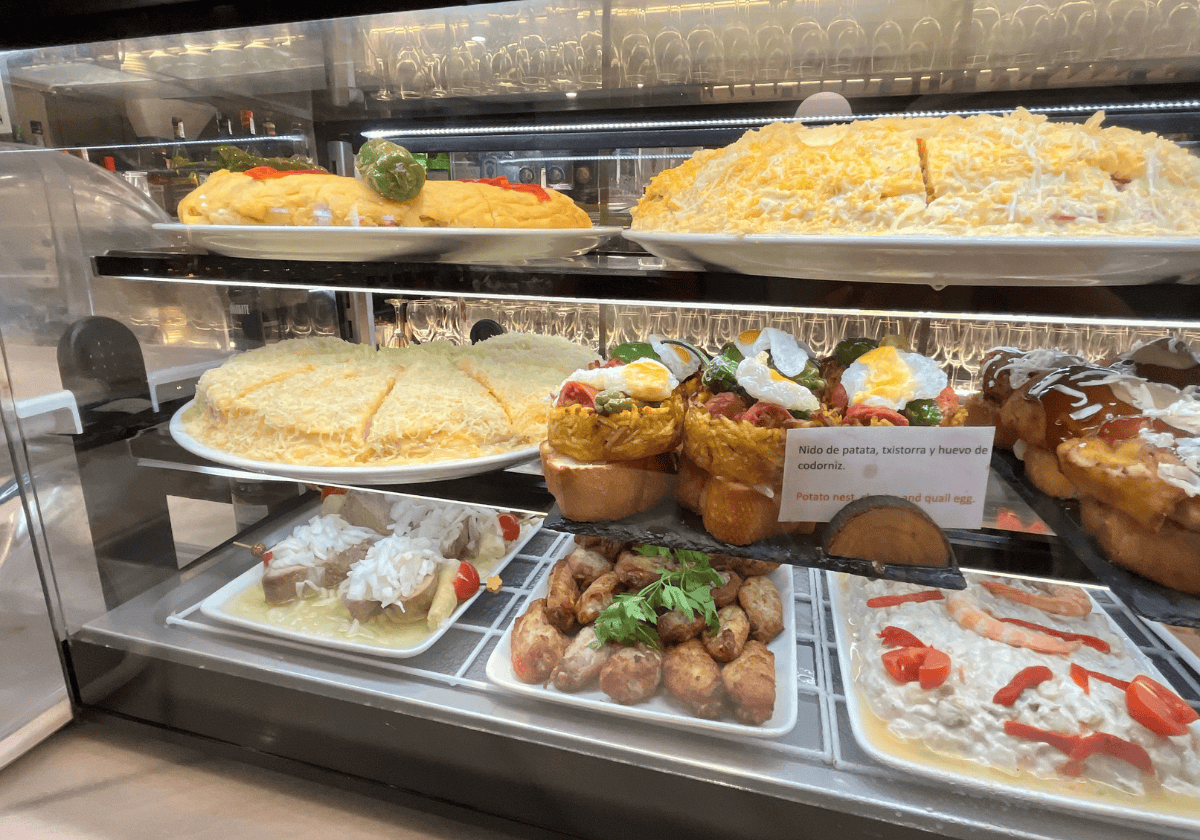 Potato frittatas and pintxo deli case at a restaurant in La Guardia, Spain Potato frittatas and pintxo deli case at a restaurant in La Guardia, Spain